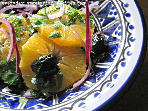 tossed mix of oranges, olives, red onion and herbs