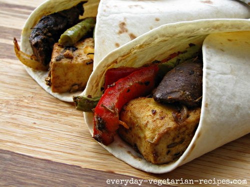 2 flour tortillas filled with tofu and vegetables